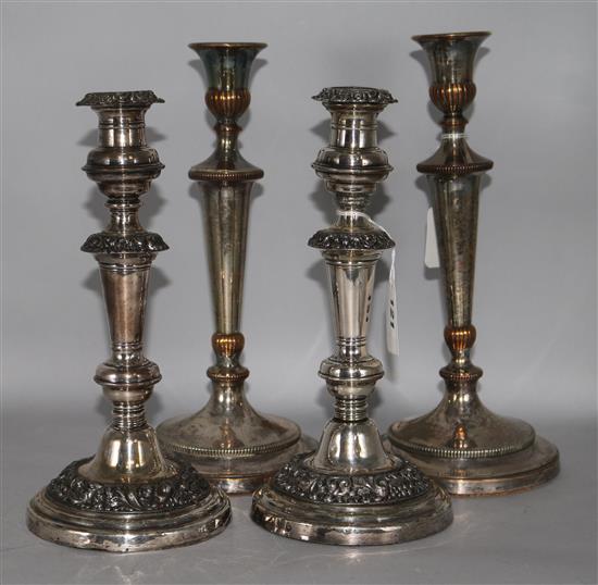 Two pairs of plated candlesticks